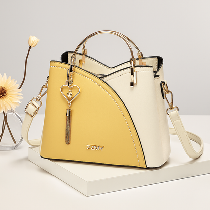 Bolsa Melvie Vie Crossbody con Asa Dorada