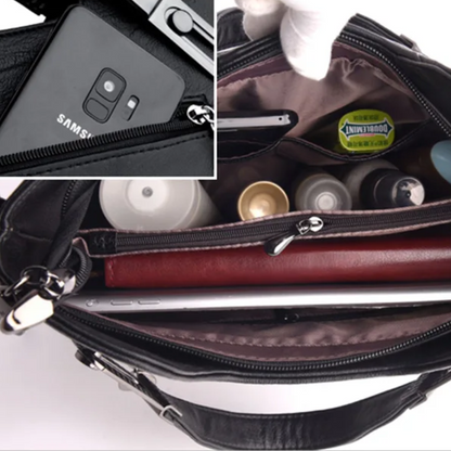 Bolsa de Mano en Cuero con Asa Ajustable