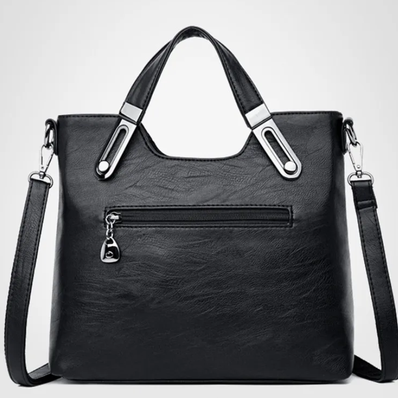 Bolsa de Mano en Cuero con Asa Ajustable