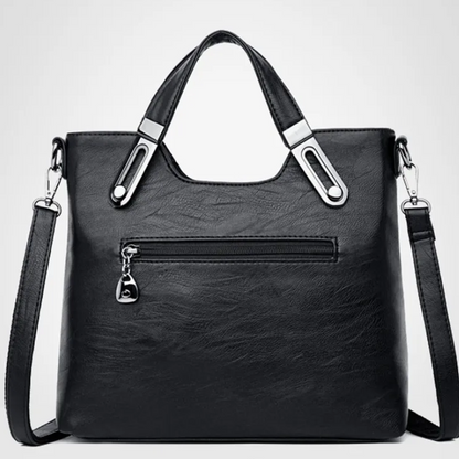 Bolsa de Mano en Cuero con Asa Ajustable