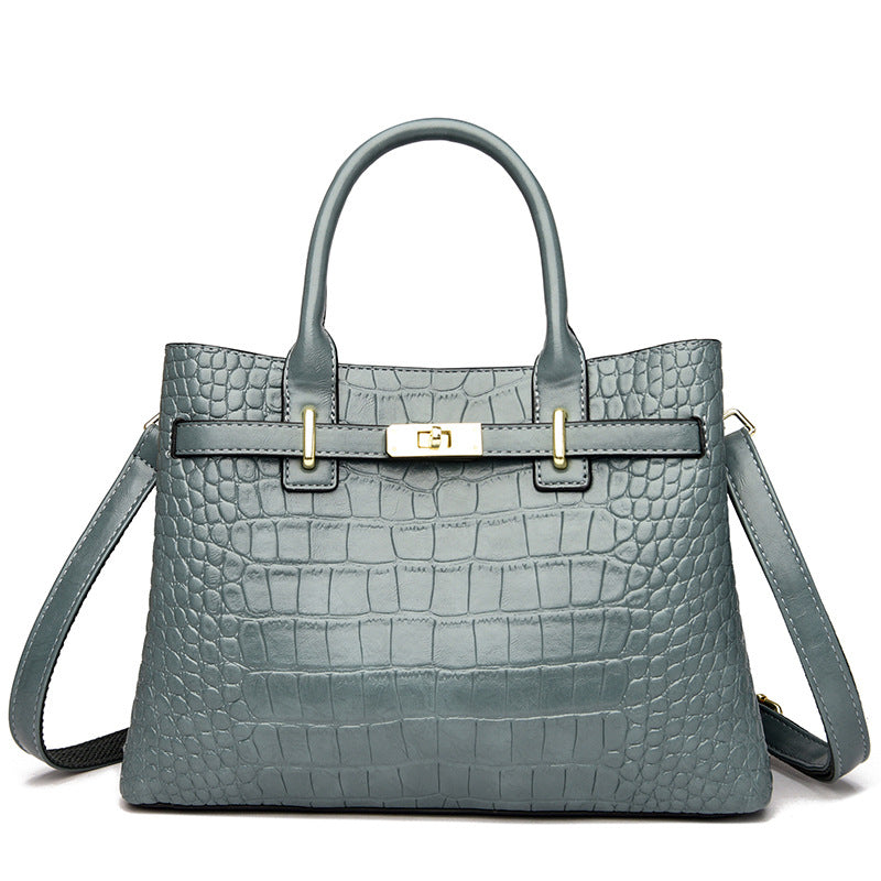 Bolso de mano con textura de croco Elegancia atemporal